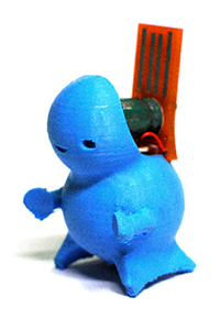 Photo of a 3D printed character that looks a bit like a suno wrestler